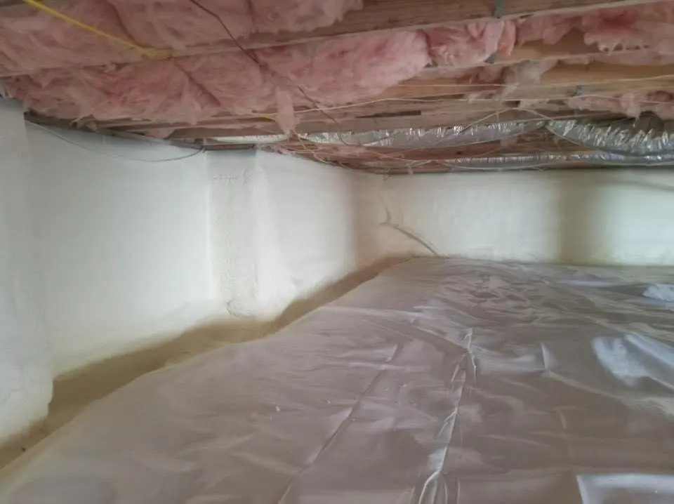 Crawl space encapsulation with closed-cell spray foam for Roof Waterproofing in New Smyrna Beach